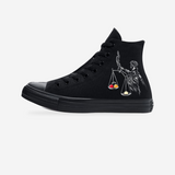 Fist of Knowledge | Blackout Converse — original artwork on a light-gray studio background.