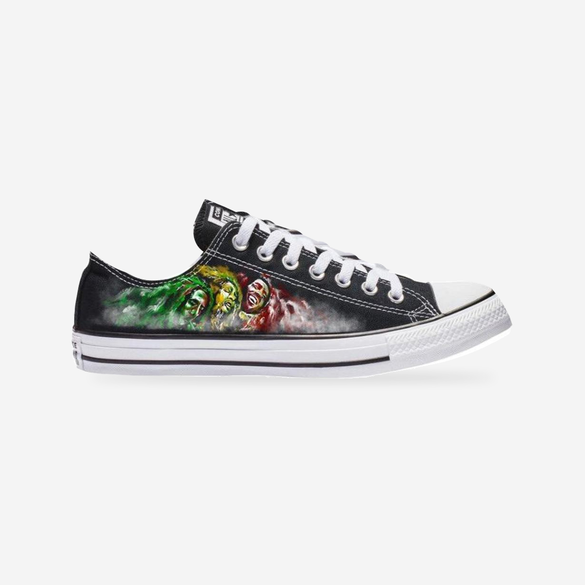 Bob Marley Pure Joy custom Converse low-top sneaker, side view on a light gray background.